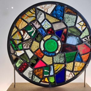 Heritage Stories - timber mounted reclaimed roundel panel